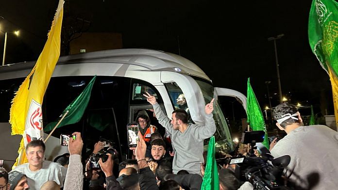 A released Palestinian prisoner reacts after leaving the Israeli military prison, Ofer, amid a hostages-prisoners swap deal between Hamas and Israel, near Ramallah in the Israeli-occupied West Bank | Reuters