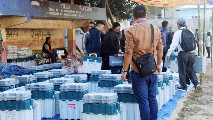 Polling officials collect their polling materials before leaving for their respective polling stations on the eve of the Mizoram Assembly Elections, in Aizawl on Monday | ANI