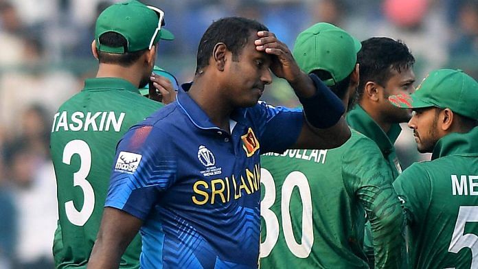 Sri Lanka's Angelo Mathews reacts after being timed-out during the World Cup match against Bangladesh, at Arun Jaitley Stadium in New Delhi on Monday | ANI