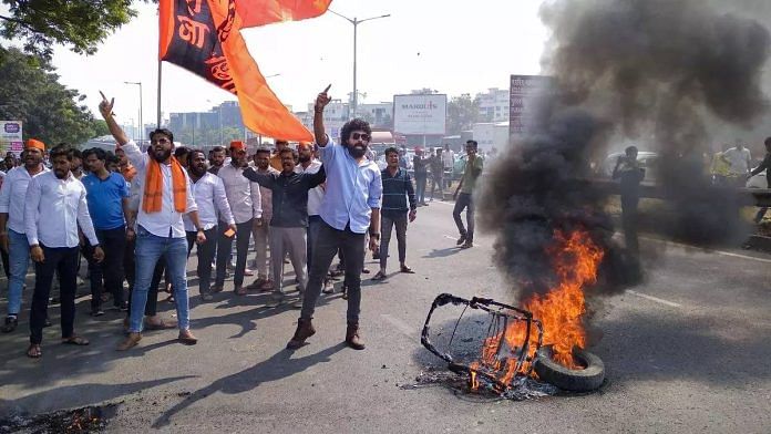People burn tyres and other items during a protest on the Pune-Bangalore Expressway last month to press for Maratha reservation | Photo: PTI