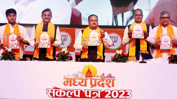 Union minister Jyotiraditya Scindia, BJP MP chief V.D. Sharma, BJP national president J.P. Nadda, MP CM Shivraj Singh Chouhan, and Union minister Ashwini Vaishnaw release the BJP manifesto for Madhya Pradesh in Bhopal, Saturday | ANI