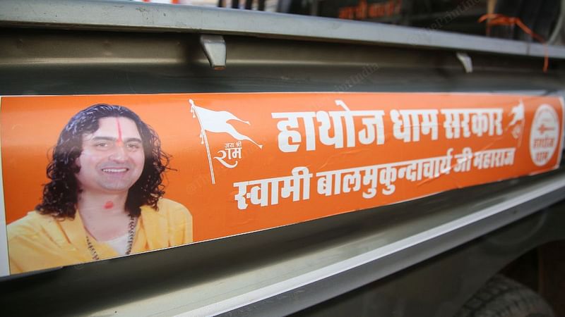 A poster of mahant Balmukund Acharya, BJP's candidate from Hawa Mahal constituency | Photo: Manisha Mondal, ThePrint