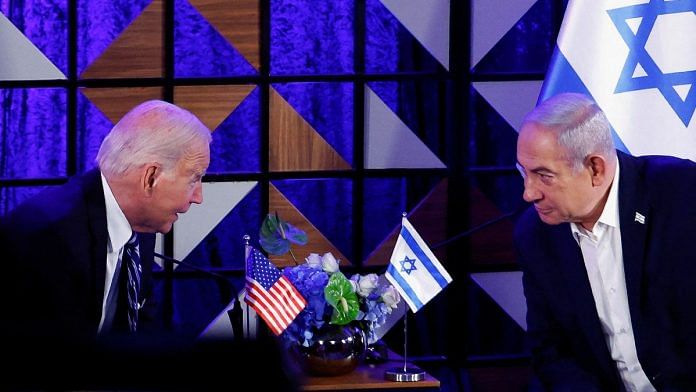 US President Joe Biden with Benjamin Netanyahu, PM of Israel, in Tel Aviv on 18 Oct 2023 | Reuters/Evelyn Hockstein