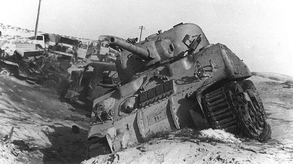 Damaged Egyptian tank & vehicles during Suez Canal crisis | Commons