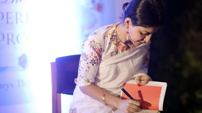 Divrina Dhingra signs a copy of her book The Perfume Project | By special arrangement