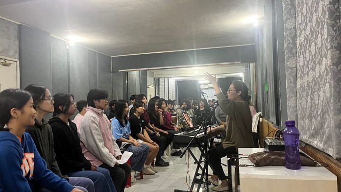 Bright Lights Choir, hard at practice for Hornbill | Photo