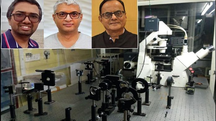 Optical tweezer apparatus used in the experiment at PSA Ajay Sood’s lab at IISc. Inset (L-R): Sudeesh Krishnamurthy, Rajesh Ganapathy, and Ajay Sood | Credit: Sudeesh Krishnamurthy