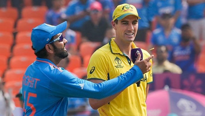 Indian captain Rohit Sharma and Australian captain Pat Cummins at the toss before the ICC Men’s Cricket World Cup 2023 final, on 19 Nov 2023 | PTI