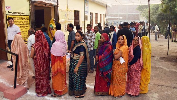 Women voters queue up to cast votes for Madhya Pradesh Assembly polls, Friday | ANI