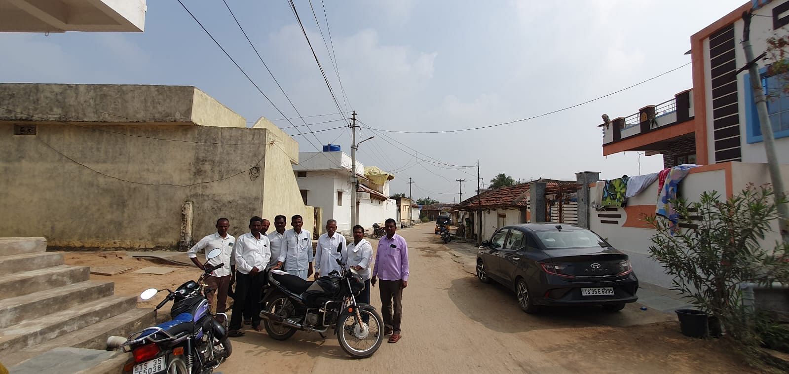 P. Balaiah, P. Brahmam, Narsa Goudu and a group of other men pose in Fareedpur village | Sharan Poovanna | ThePrint 