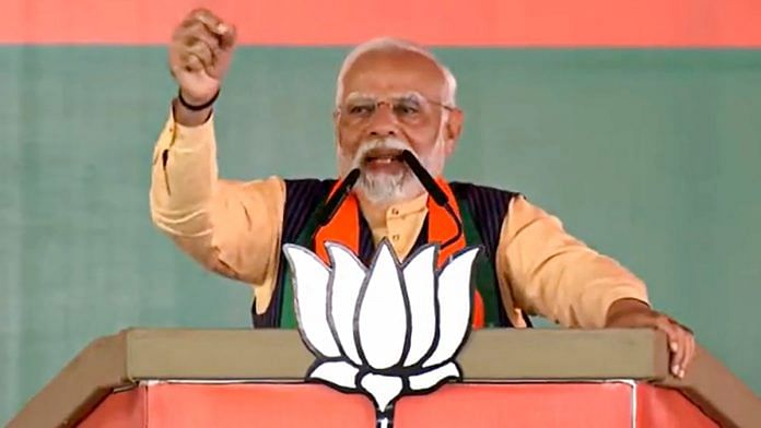 PM Narendra Modi addresses a public meeting ahead of Madhya Pradesh Assembly elections, in Betul district, on 14 Nov 2023 | PTI