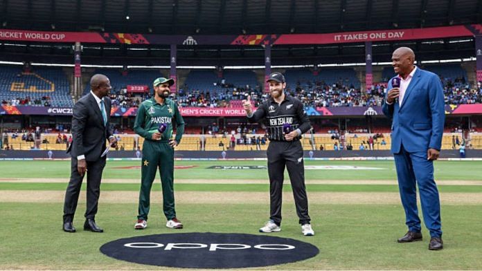 Captains Kane Williamson & Babar Azam at the toss during the match between New Zealand & Pakistan in the ICC Men's Cricket World Cup 2023, at M. Chinnaswamy Stadium in Bengaluru, 4 November | Photo: ANI