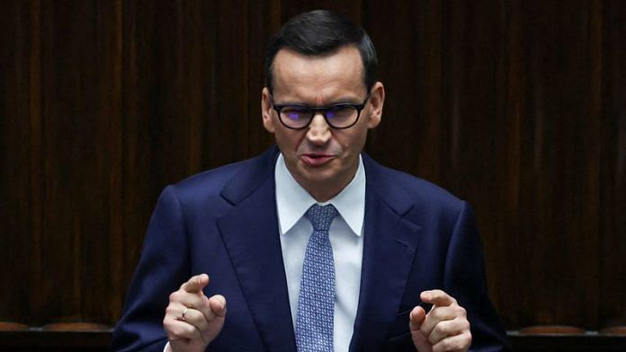 Polish PM Mateusz Morawiecki speaks during the first session of the newly elected Polish parliament in Warsaw | Reuters