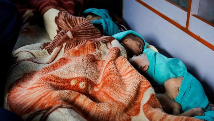 Premature babies, who were evacuated from Al Shifa hospital, lie in an ambulance before they are transported for treatment in UAE, at Rafah border crossing with Egypt, in Rafah, on 20 Nov 2023 | Reuters