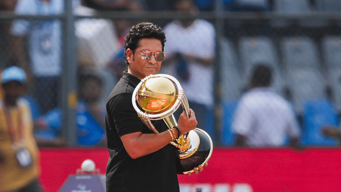 Former Indian cricketer Sachin Tendulkar carrying the ICC Men's Cricket World Cup 2023 trophy at the Wankhede Stadium in Mumbai | PTI