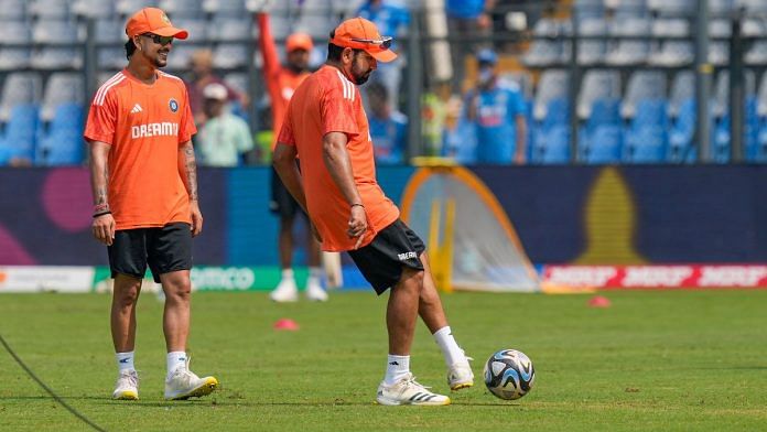 India's captain Rohit Sharma with teammate Ishan Kishan during a warm up session before the start of the ICC Men's Cricket World Cup 2023 semi-final match between India and New Zealand, at the Wankhede Stadium on Wednesday | PTI Photo: Manvender Vashist Lav