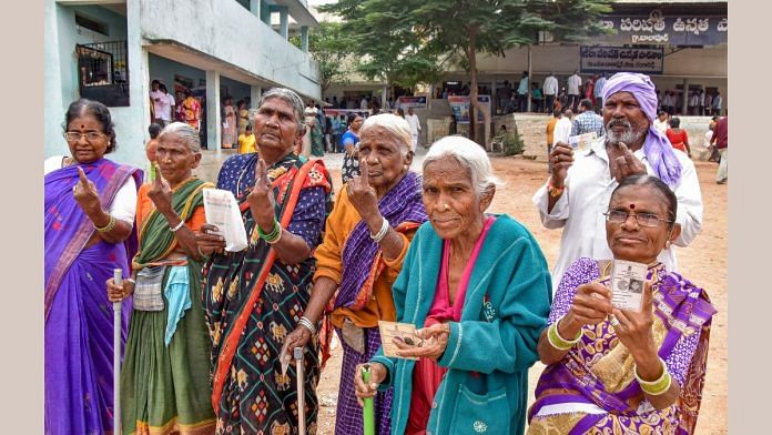 Voters show their fingers marked with indelible ink after casting their votes for the Telangana Assembly elections, in Hyderabad, Thursday | PTI Photo