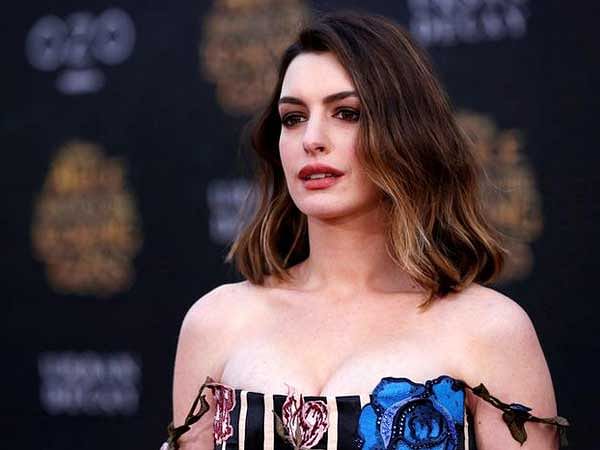Anne Hathaway says she and her husband Adam Shulman "make each other better"