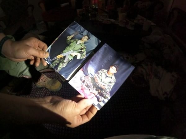 Photos of Palestinian kids dressed in Hamas uniforms found amid arms stockpile