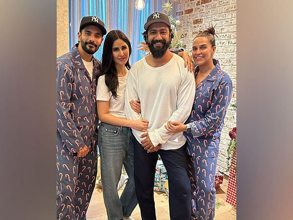 Vicky, Katrina Pose With Neha Dhupia, Angad Bedi At Christmas Bash ...