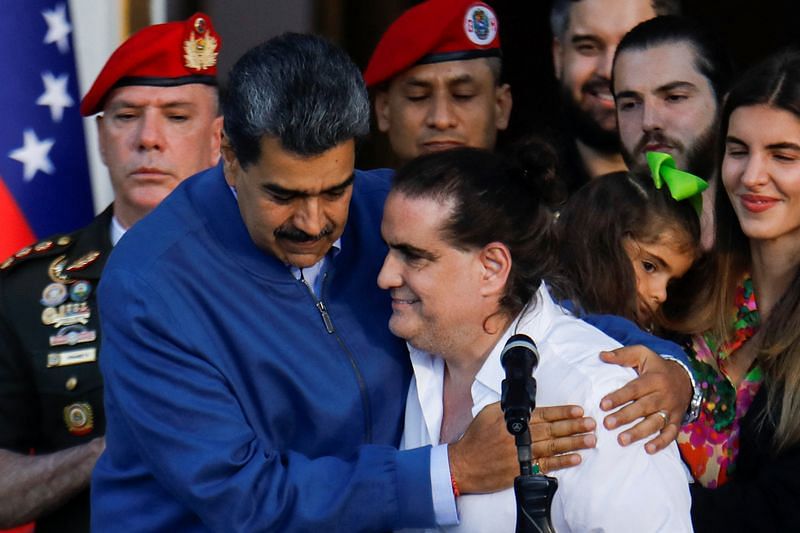 Americans freed by Venezuela in US prisoner swap land at Texas base ...