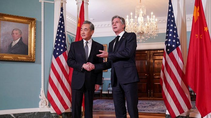 US Secretary of State Antony Blinken shakes hands with Chinese Foreign Minister Wang Yi as they meet at the State Department in Washington | Reuters file photo