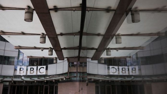 The BBC logo is displayed above the entrance to the BBC headquarters in London | Reuters file photo