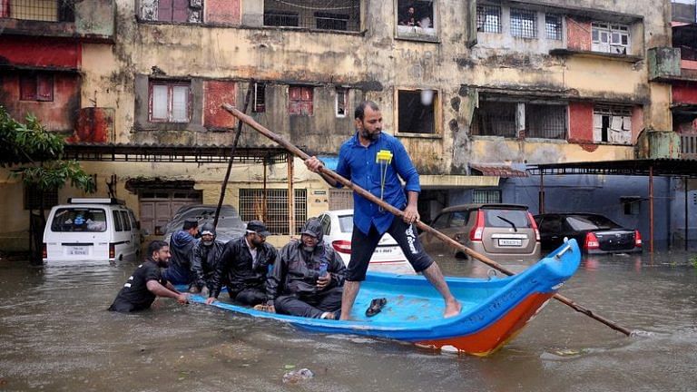 Rescuers use boats, ropes to reach the stranded as Cyclone Michaung batters Chennai