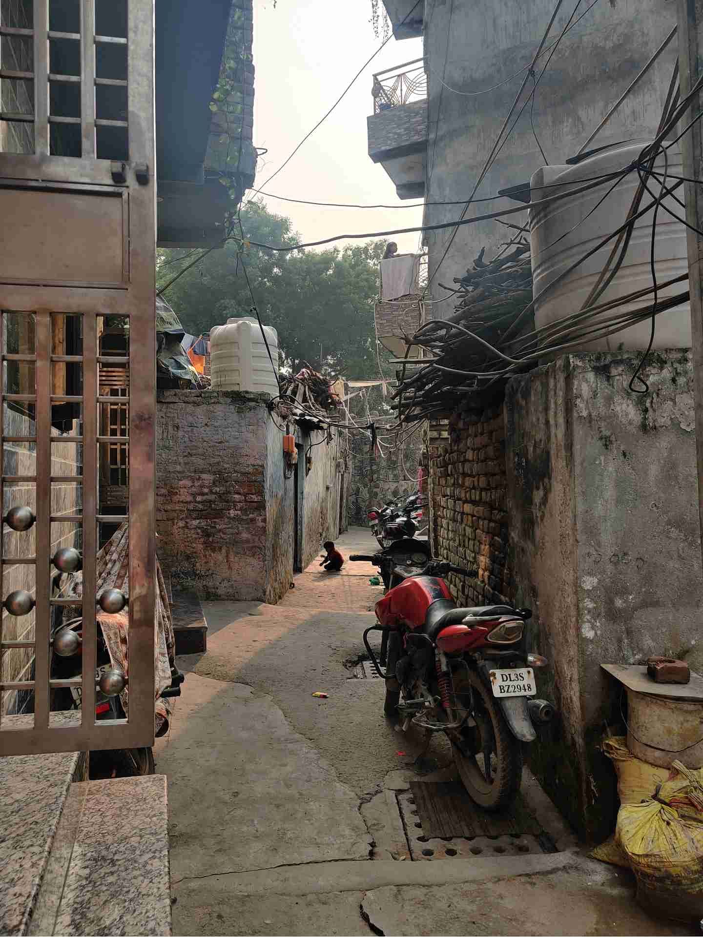 A child plays in a narrow lane at Molarband village | Bismee Taskin | ThePrint