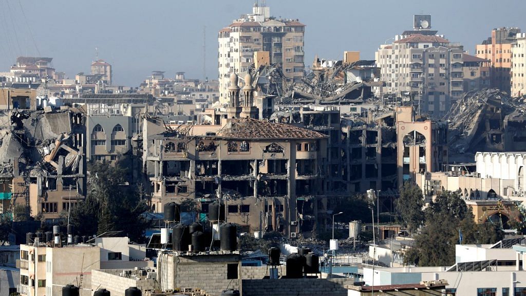 Damaged buildings in aftermath of Israeli strikes in Gaza, on 13 Oct, 2023 | Reuters/Saleh Salem