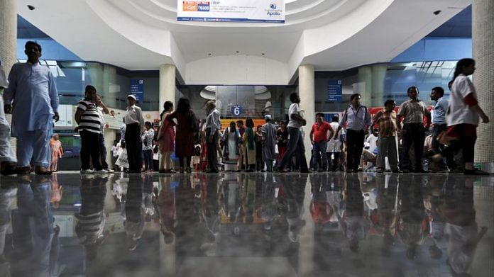 Patients and their attendants are seen inside Apollo hospital in New Delhi | Reuters file photo