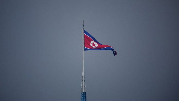 A North Korean flag flutters at the propaganda village of Gijungdong in North Korea | Reuters
