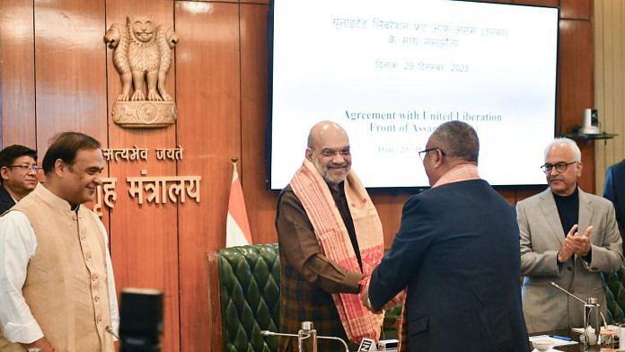 Union Home Minister Amit Shah along with Assam CM Himanta Biswa Sarma and others during the ULFA's pro-talks faction's signing of a tripartite Memorandum of Settlement with the Centre and the Assam government, in New Delhi on Friday | ANI
