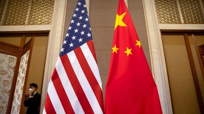 Flags of the United States and China | Image via Reuters