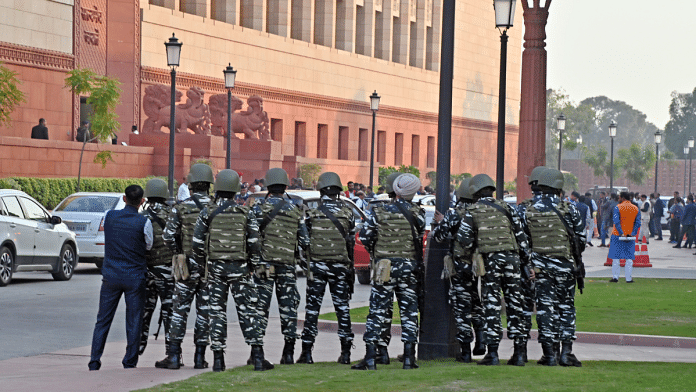 Paramilitary personnel outside Parliament building following a security breach incident | ANI