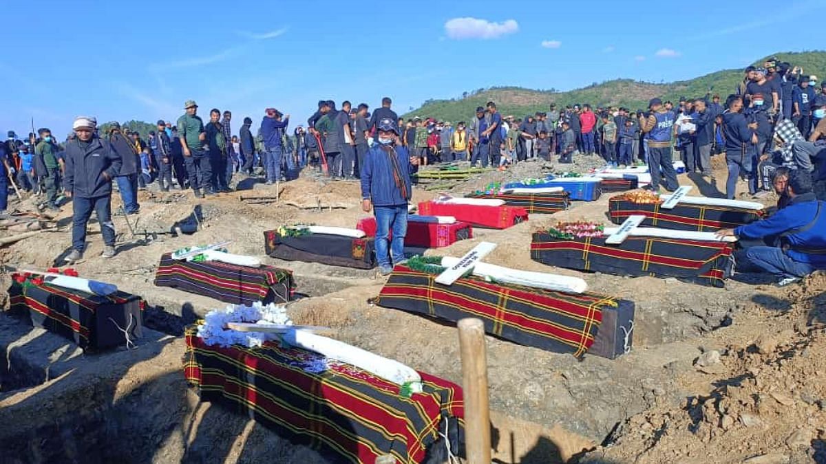 Coffins at Wednesday's mass burial | By special arrangement