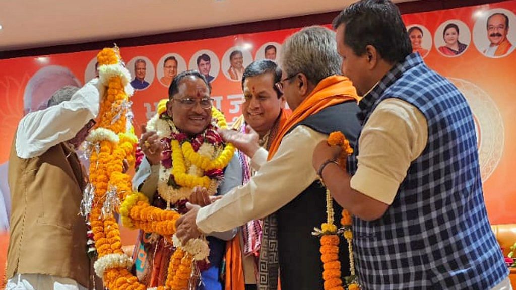 Union Minister Sarbananda Sonowal and other BJP leaders congratulate Vishnu Deo Sai as he is named the first tribal chief minister of Chhattisgarh, in Raipur on Sunday | ANI