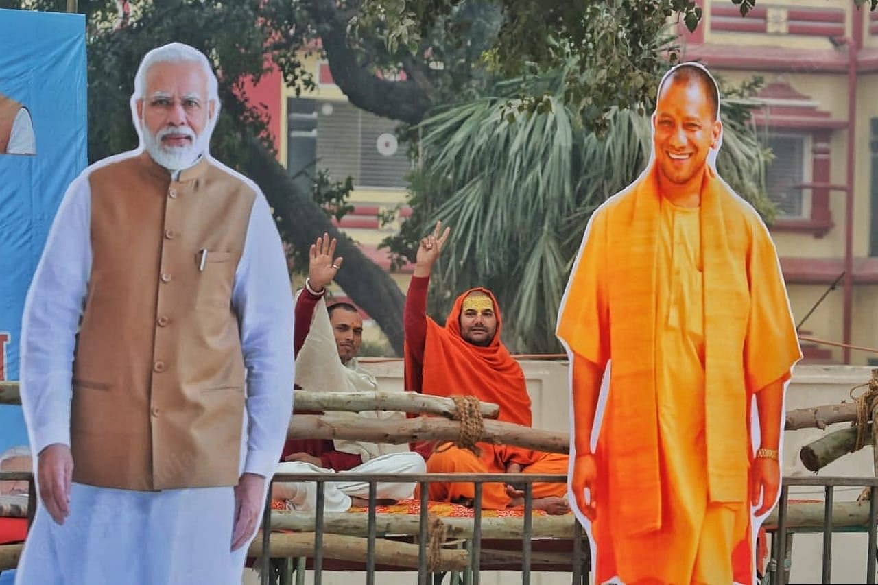 Sadhus sitting waving in front of the Shri Ram Janmabhoomi path. | Praveen Jain | ThePrint