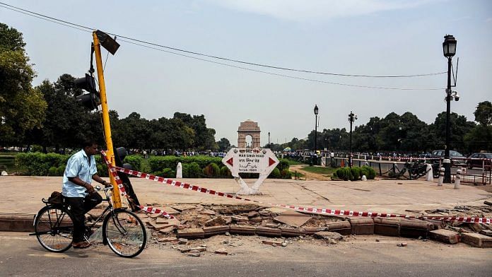A man on a bicycle passes near an accident site at Man Singh Road in New Delhi | Representational image | ANI file photo