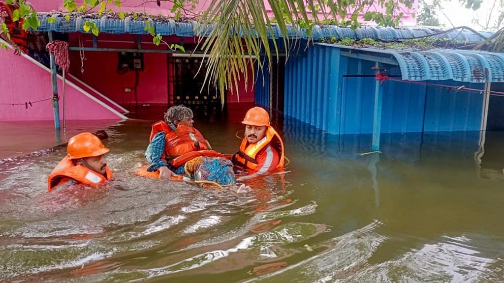 The National Disaster Response Force (NDRF) conducts a rescue operation in an area waterlogged due to heavy rainfall, in Chennai Tuesday | ANI