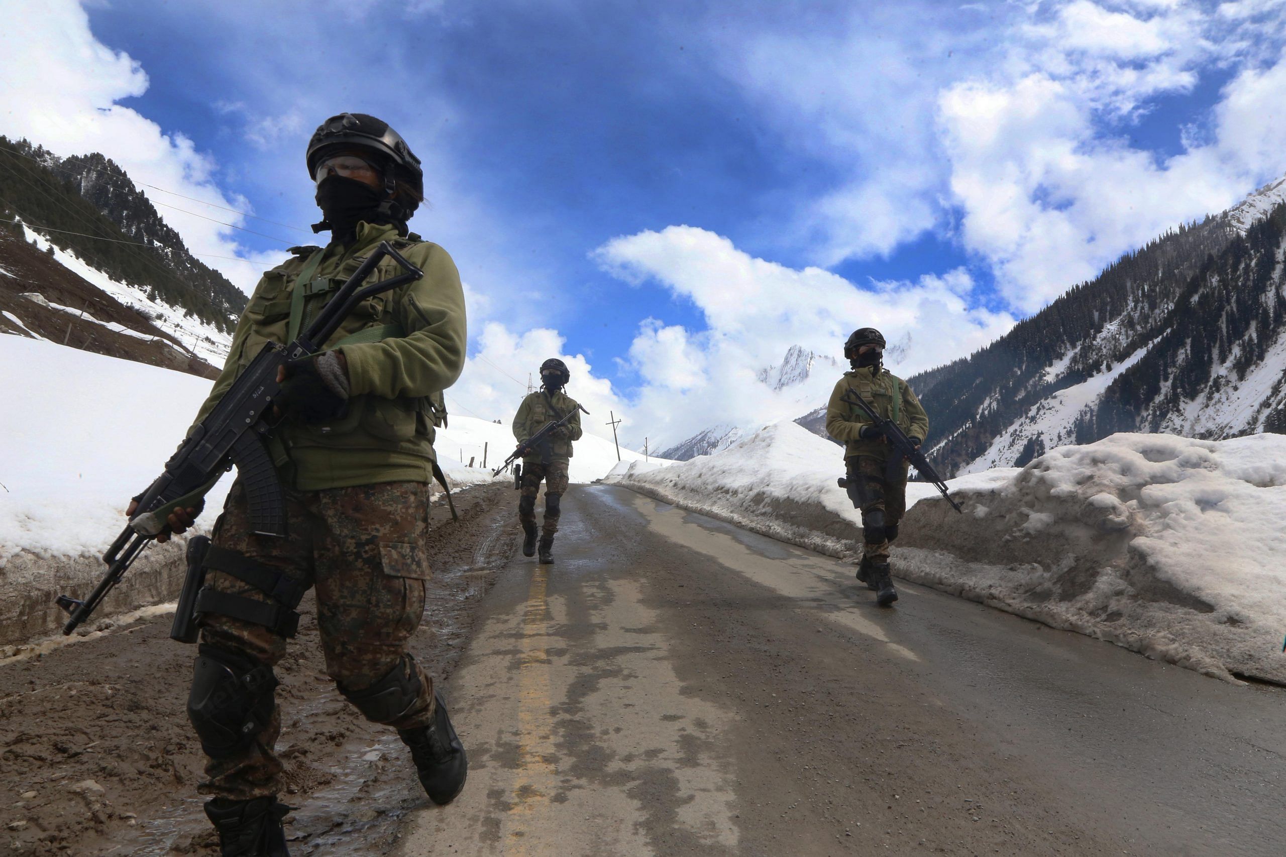 Life is often as rough for these women as the road and terrain they are traversing here. Members of the CRPF's Valley Quick Action Team demonstrate how they patrol the Amarnath road | Photo: Manisha Mondal | ThePrint
