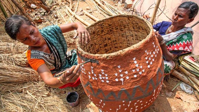 Tribal artisans prepare their stalls for the annual Odisha Adivasi Mela, in Bhubaneswar last year | Representational image | ANI