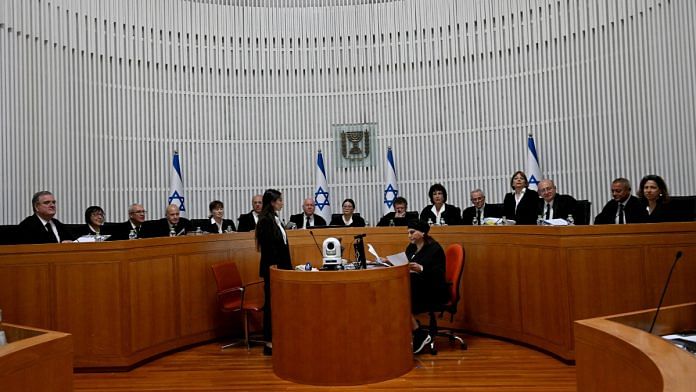 President of the Supreme Court of Israel Esther Hayut and all fifteen justices assemble to hear petitions against the reasonableness standard law in the High Court in Jerusalem, on Tuesday, September 12, 2023. DEBBIE HILL/Pool via REUTERS