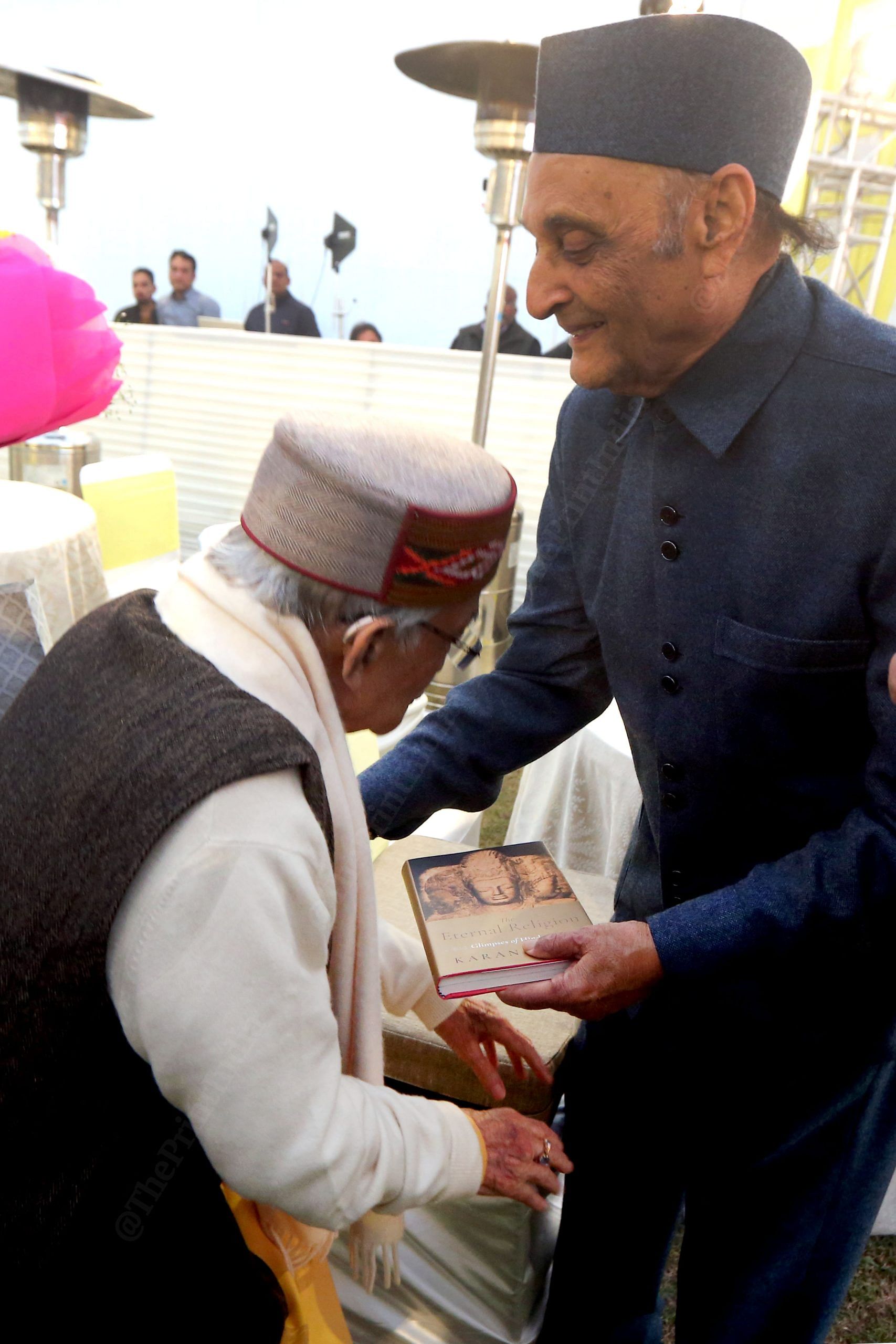 Murli Manohar Joshi (90) seeks the blessings of Congress leader Dr Karan Singh (92) by touching his feet | Praveen Jain | ThePrint
