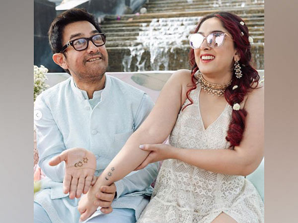 Aamir Khan recreates Ira's tattoo on his hand as mehendi design during her wedding