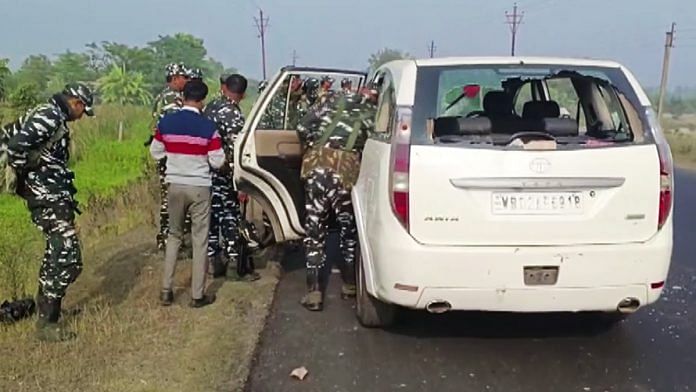 Security personnel inspect a vehicle of the Enforcement Directorate team which was attacked during a raid in West Bengal's Sandeshkhali, in North 24 Parganas, on 5 Jan 2024 | ANI