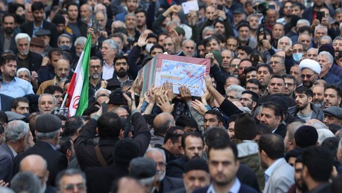 People carry the coffin of Faezeh Rahimi, one of the casualties of the Islamic State attack in Kerman, after Friday prayers in Tehran, Iran, January 5, 2024. Majid Asgaripour/WANA (West Asia News Agency) via REUTERS