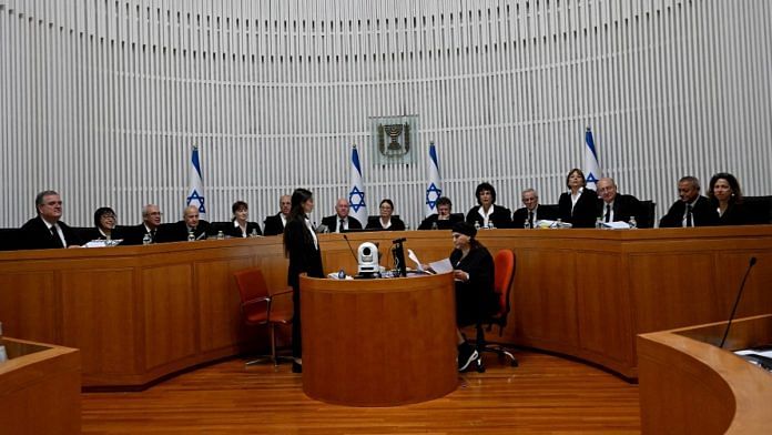 File photo of president and justices of Supreme Court of Israel assembling to hear challenges to 'reasonableness limitation' law | Reuters via Debbie Hill