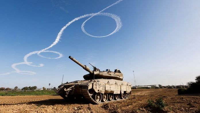 A tank stands near the border with the central Gaza, as the conflict continues between Israel and the Palestinian Islamist group Hamas, Israel January 22, 2024. REUTERS/Amir Cohen