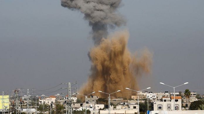 Smoke rises following Israeli strikes, amid the ongoing conflict between Israel and the Palestinian Islamist group Hamas, as seen from Rafah, in the southern Gaza Strip, January 18, 2024. REUTERS/Ibraheem Abu Mustafa/File Photo